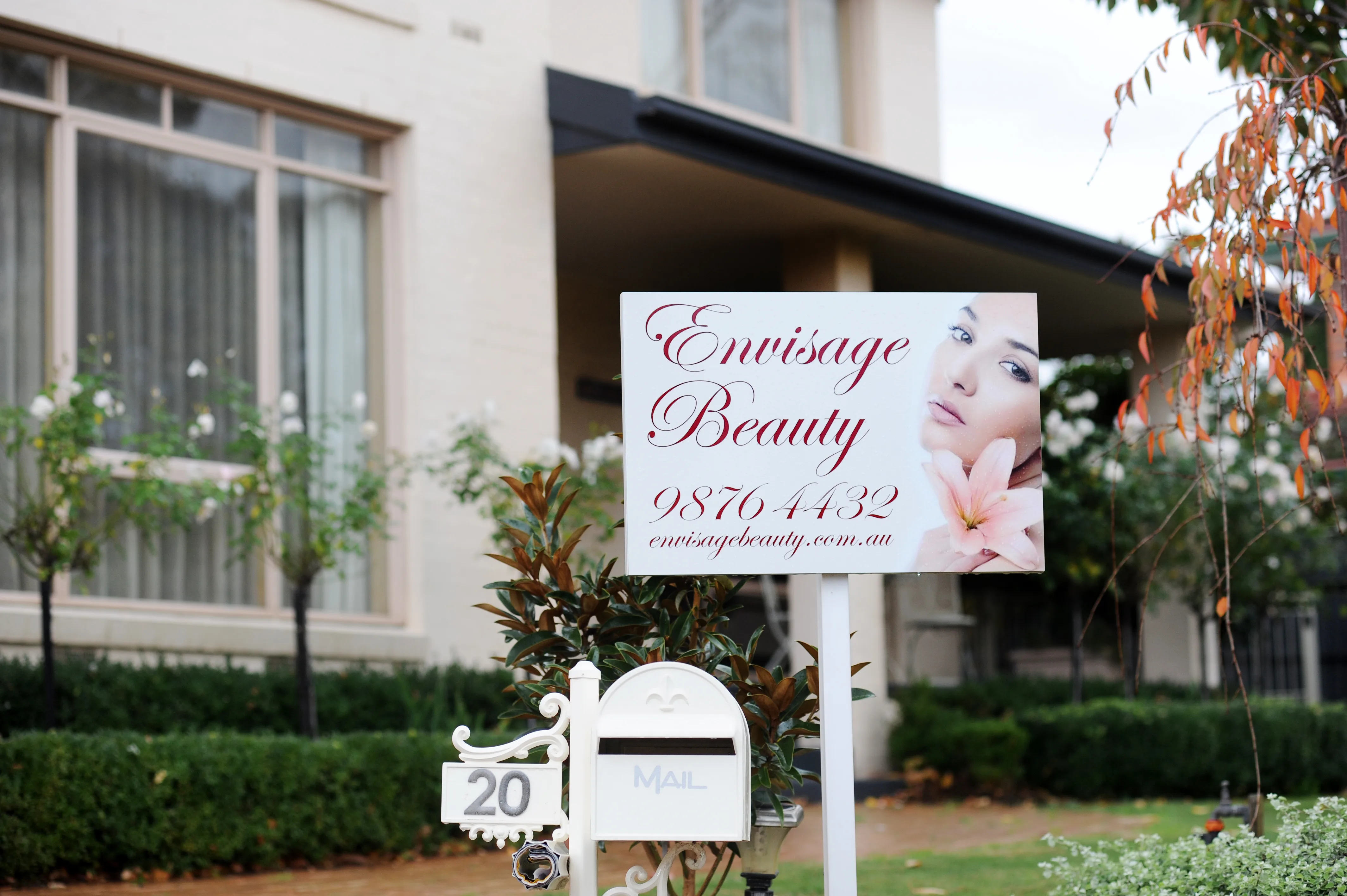 Envisage Beauty garden sign at 20 Heron Court, Ringwood North